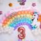 Throw a party to celebrate your child's birthday with colourful unicorn balloon decoration.