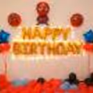 Plan your child's birthday by booking CherishX's Spider Man Birthday Surprise Decor filled with colorful balloons and foil balloons.