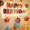 The Unicorm Birthday Surprise Decor includes different colored pastel and foil balloons!