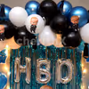 The Balloon Decoration is made up of blue, black and white balloons.