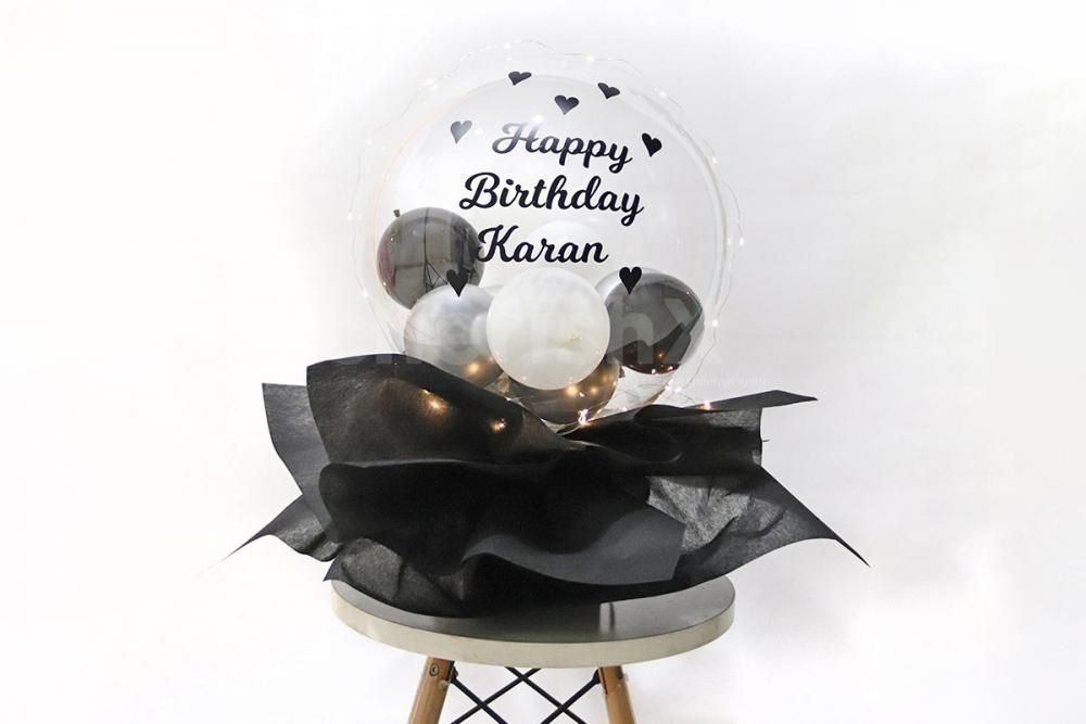 Planning to give something to your partner on anniversary? Well, then give this beautiful black balloon bucket to make it memorable!