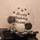 Get this big balloon bucket filled with many small balloons to surprise your love!