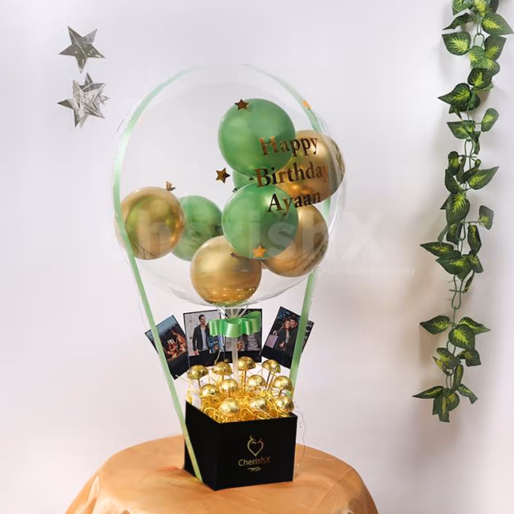 Send wishes with this extraordinary Gold & Green Balloon Bucket with Chocolates!