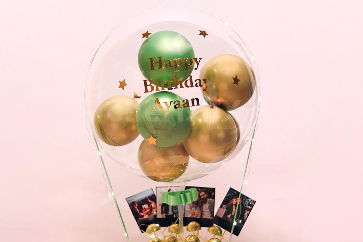 Embrace the moments of your loved one's birthday by gifting this Gold & Green Balloon Bucket with Chocolates!