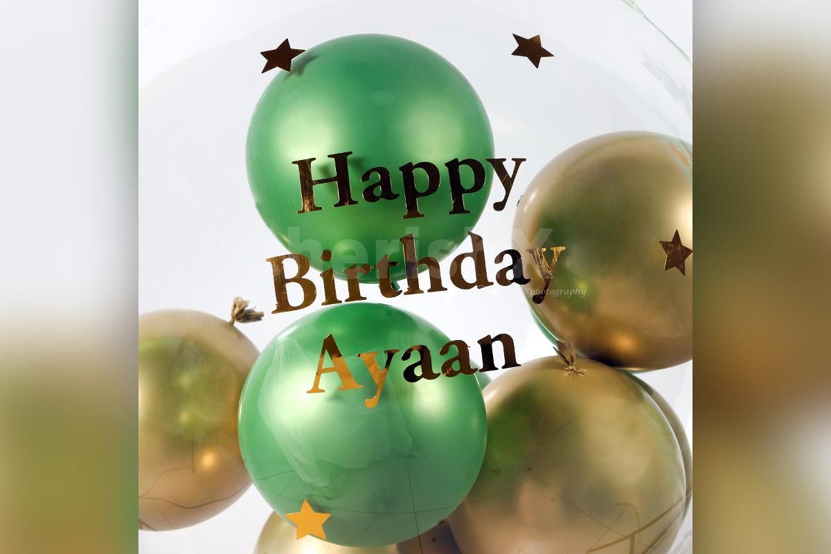 CherishX's Gold & Green Balloon Bucket with Chocolates is designed to bring joy to the face of the recipient!