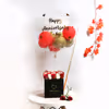 A heart-warming balloon bucket filled with white and red roses!
