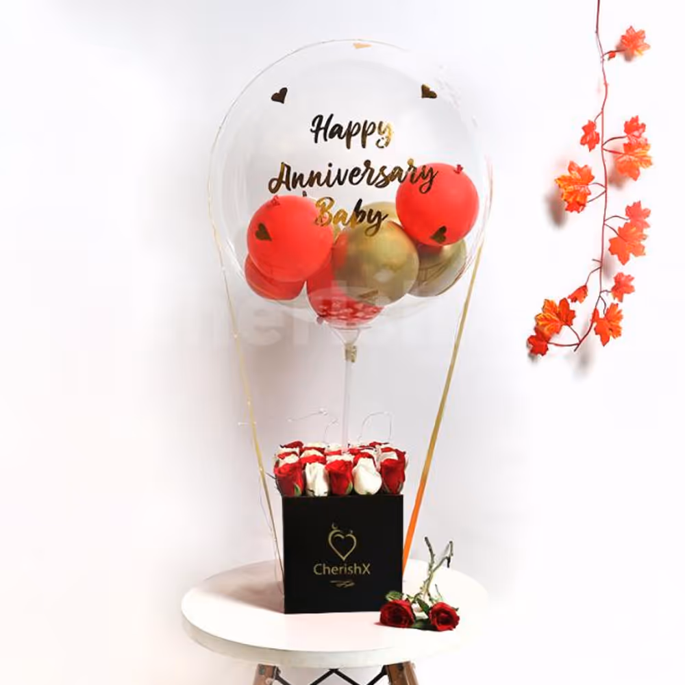 A heart-warming balloon bucket filled with white and red roses!