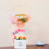 Gift this Mother's Day loving bucket filled with balloons and flowers to make the day special for your mother!