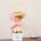 Gift this Mother's Day loving bucket filled with balloons and flowers to make the day special for your mother!