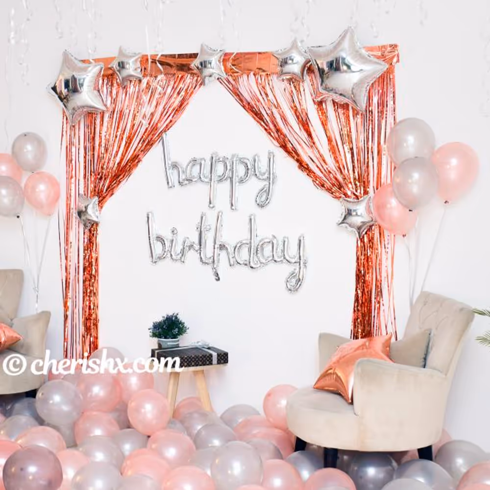 CherishX's Happy Birthday Rose Gold Surprise Decor with rosegold and metallic balloons.