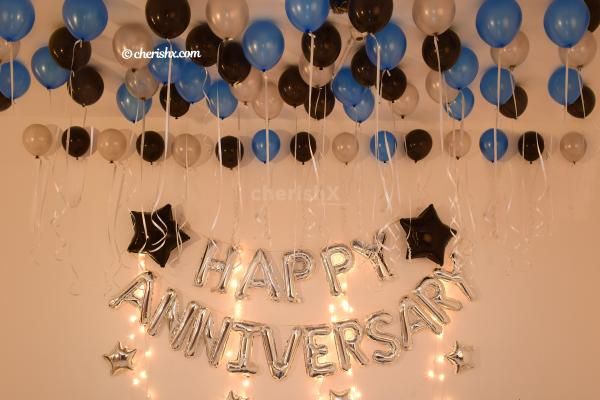 Book this attractive Blue & Silver Themed Anniversary Decor for an awesome celebration!