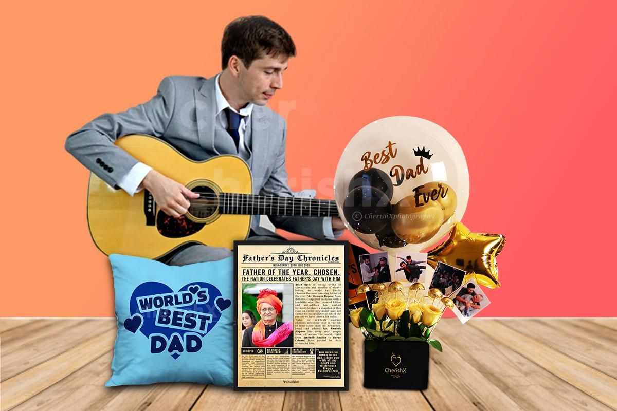 Make your father happy with CherishX's Father's Day Chronicle Frame Hamper.