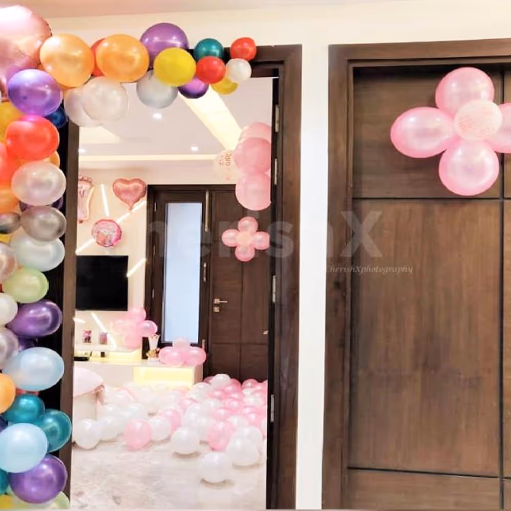 CherishX's Welcome Baby Girl Decor in a room with bunches of pink colour balloons.
