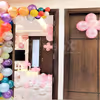 CherishX's Welcome Baby Girl Decor in a room with bunches of pink colour balloons.