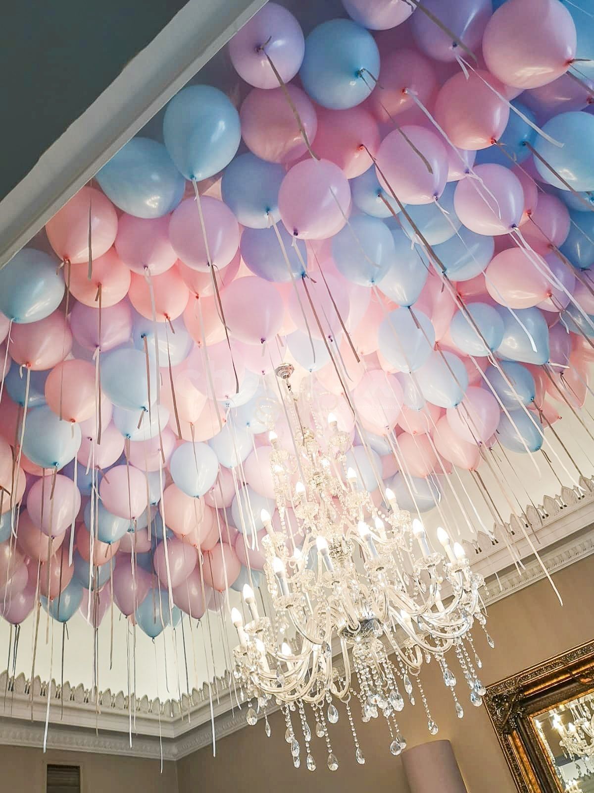 Add 50 more balloons to ceiling