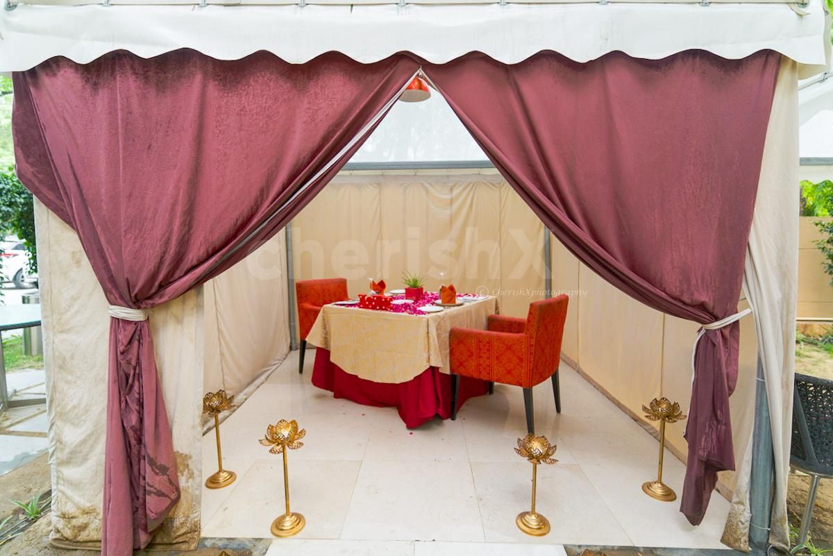 Beautifully Decorated Table with Rose Petals & Flowers