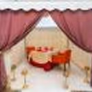 Beautifully Decorated Table with Rose Petals & Flowers