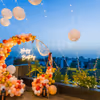 A terrace beautifully decorated with neon lights birthday decor .
