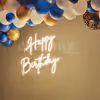 Add wonderful neon light decoration with blue and chrome balloons to your birthday party