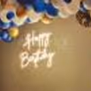 Add wonderful neon light decoration with blue and chrome balloons to your birthday party