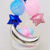 Baby shower balloon bouquet with blue and pink balloons.