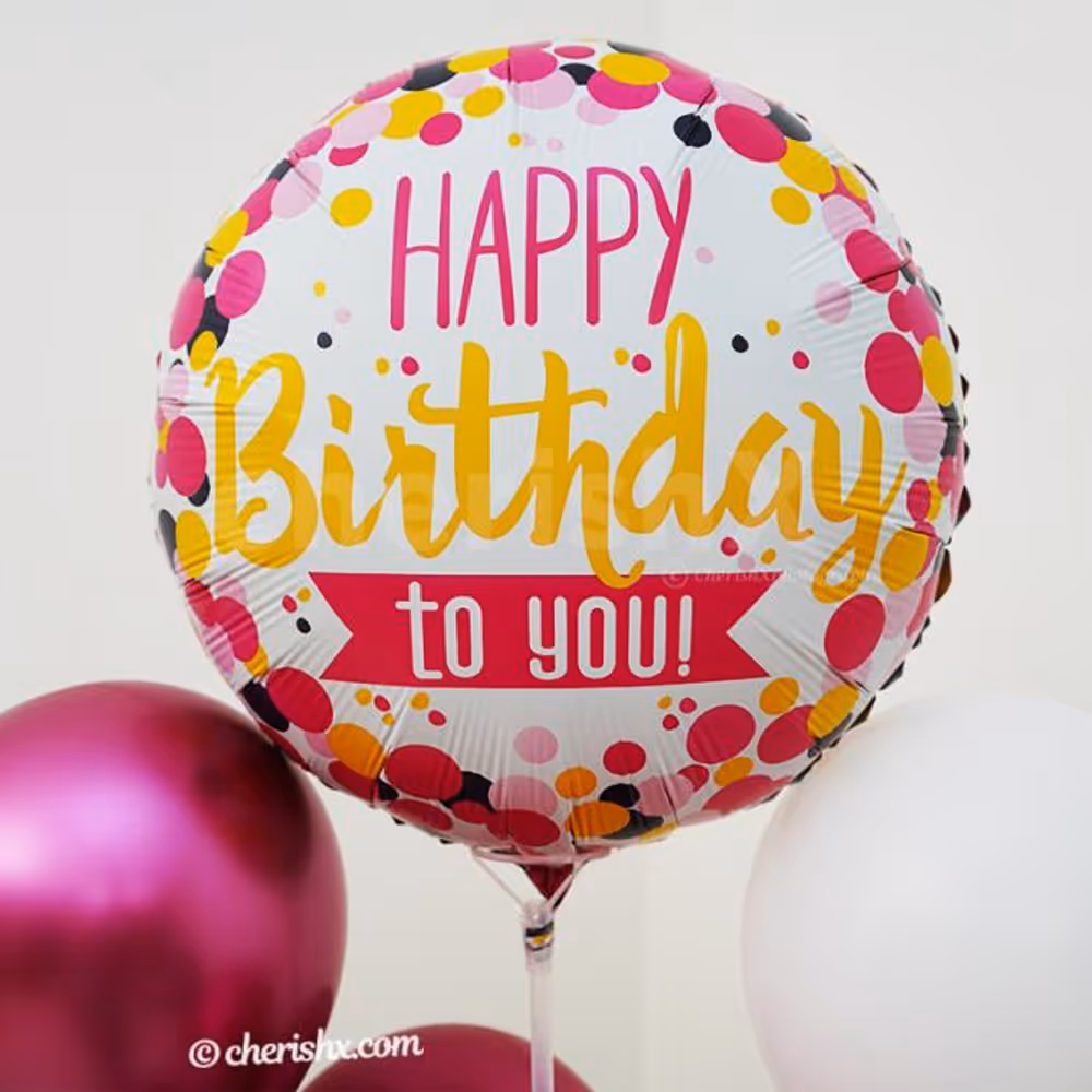 A whole bunch of pink shade balloons are mixed to present to you this pretty birthday balloon stand.