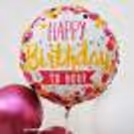 A whole bunch of pink shade balloons are mixed to present to you this pretty birthday balloon stand.