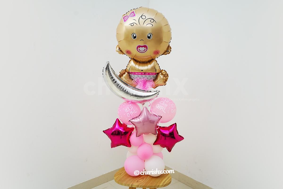 A pretty balloon bunch to give your loved ones to send good wishes on the birth of a girl child.