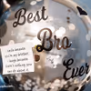 A bubble balloon with silver confetti with a message highlights the balloon bunch.