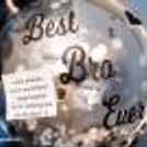 A bubble balloon with silver confetti with a message highlights the balloon bunch.