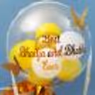 CherishX's yellow and gold Rakhi bucket consists of pictures, chocolates, and rosette for a better experience.
