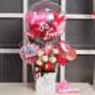 A Breathtaking Pink Rakhi Balloon Bucket for sister by CherishX!