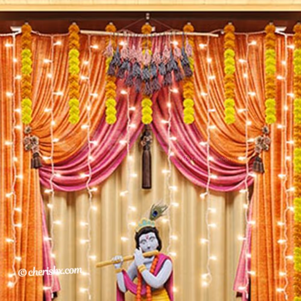 Artificial Marigold Flower String hanged on the wall.