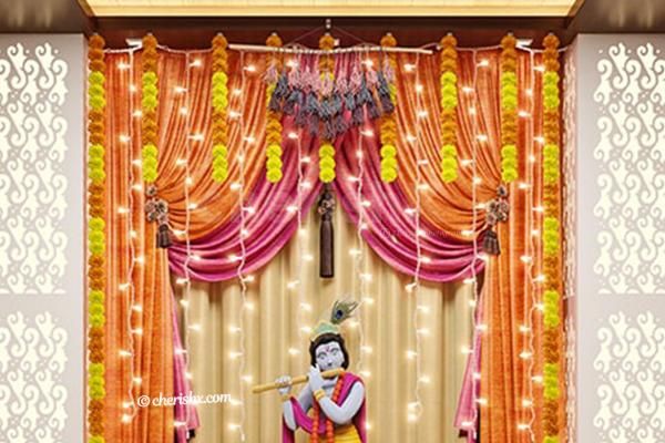 Artificial Marigold Flower String hanged on the wall.