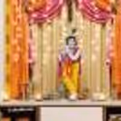 Marigold Themed Decor around the statue of Lord Krishna.