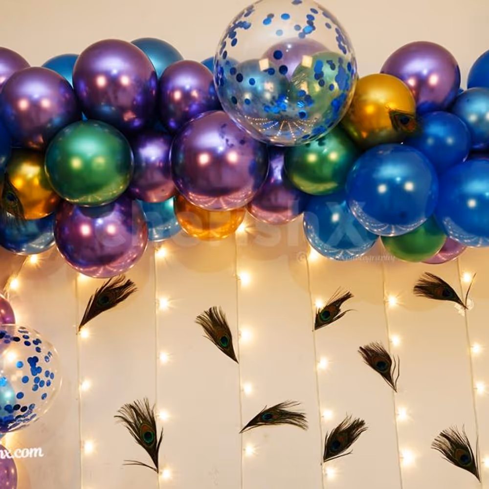 The arc has chrome balloons of color green, blue, purple, golden, and metallic blue to make your Janmashtami celebration attractive.