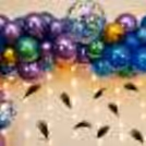 Murti of Ganesha placed at the center of the Peacock Themed Balloon Decor for Ganesh Chaturthi!