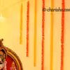 Garlands hanging from the ceiling for decorting the walls of the home for Ganesh Chaturthi!