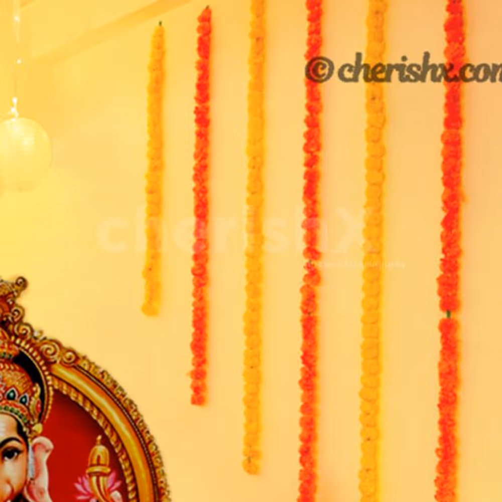 Garlands hanging from the ceiling for decorting the walls of the home for Ganesh Chaturthi!