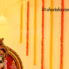 Garlands hanging from the ceiling for decorting the walls of the home for Ganesh Chaturthi!