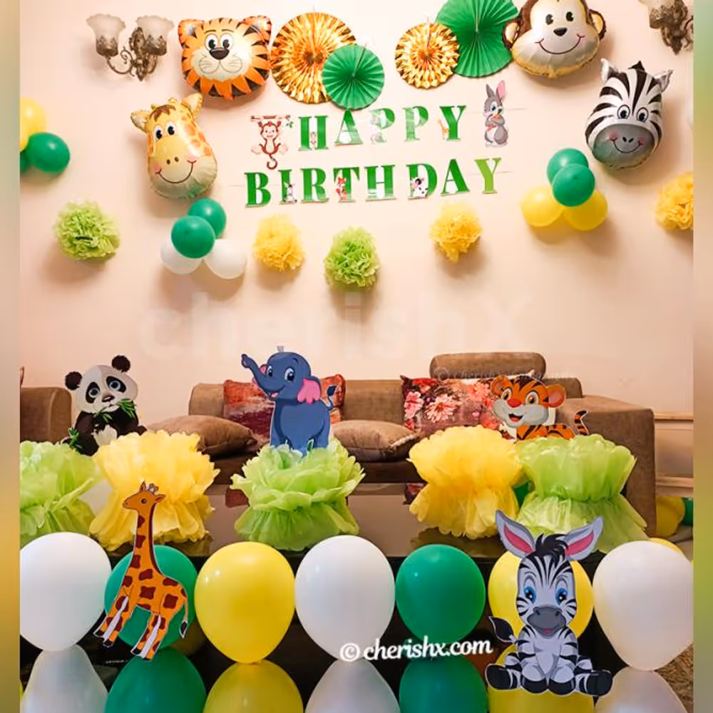 CherishX's Jungle Themed Birthday Decor includes wall and table decor with themed cut-outs.