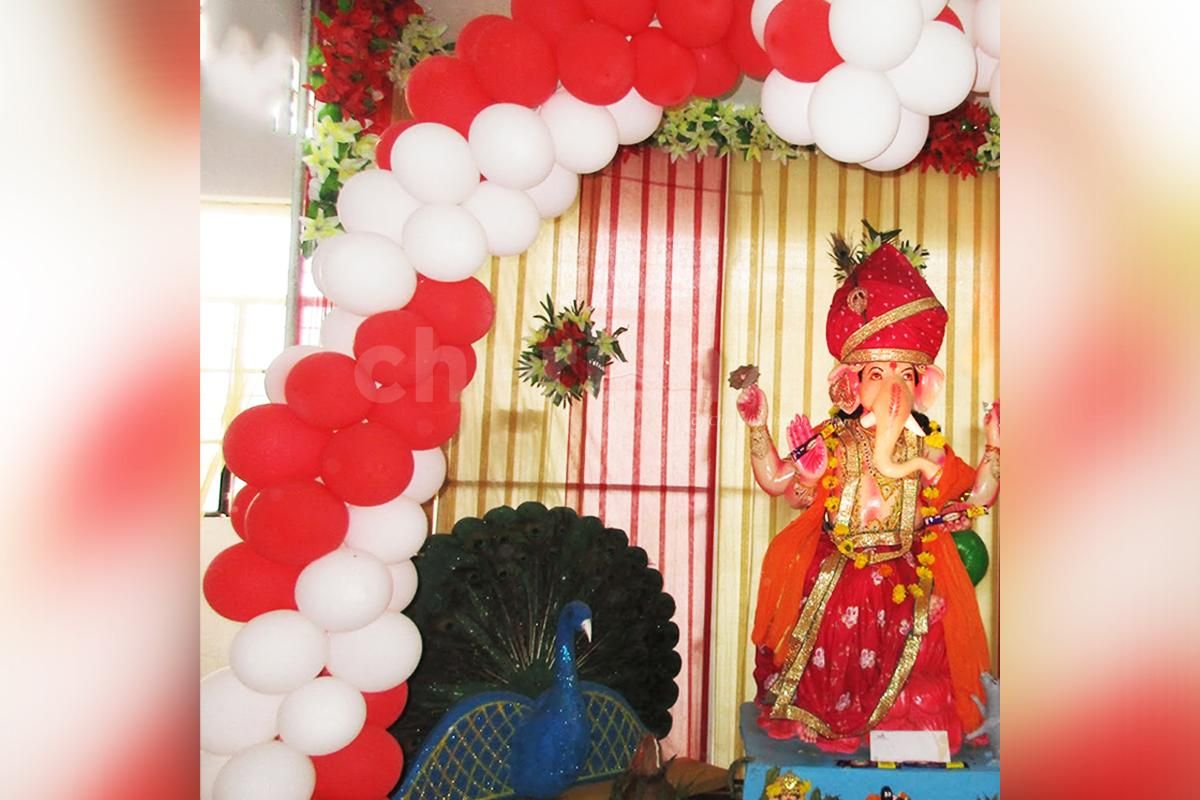 CherishX's White and Red Ganesh Chaturthi Balloon Decoration