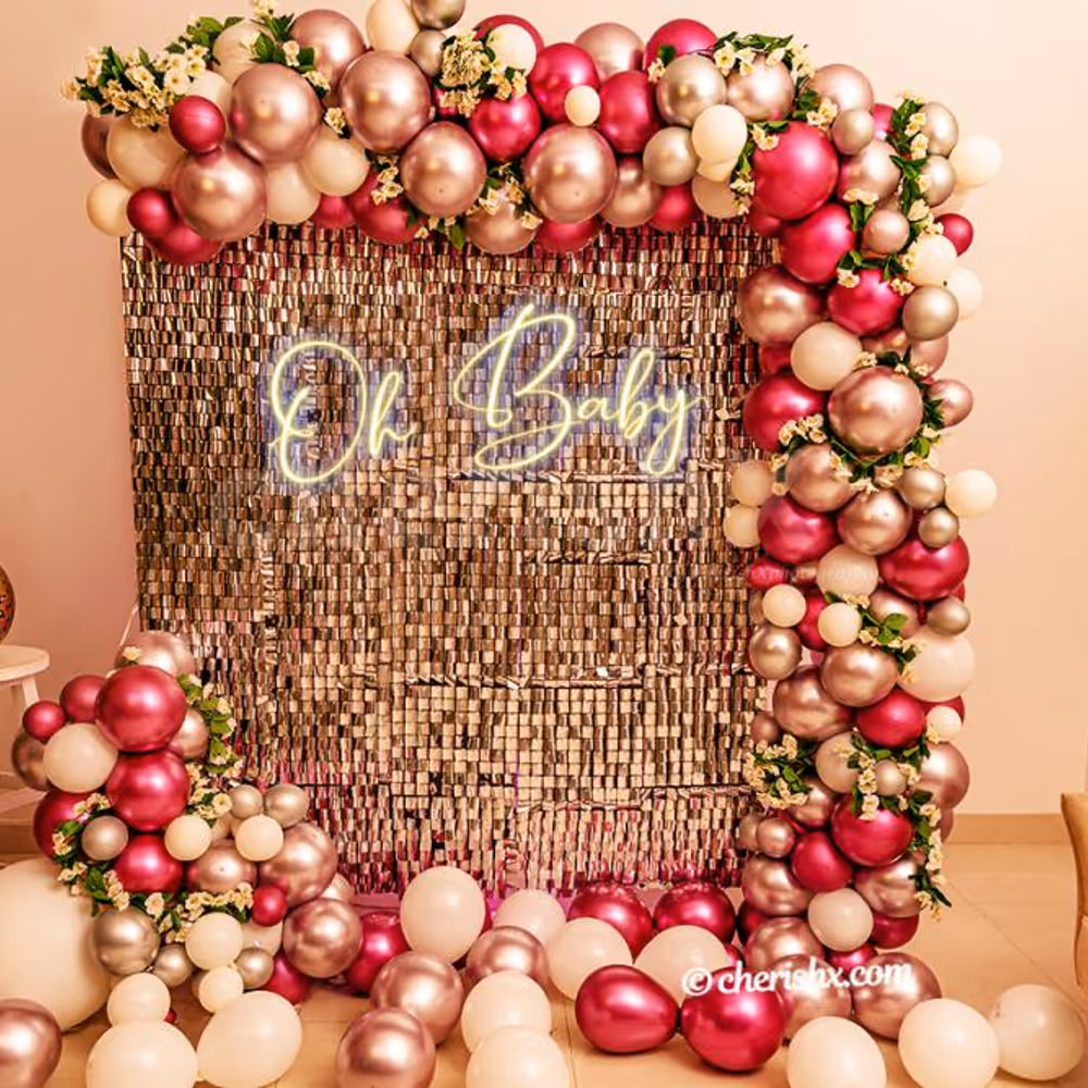 Balloon Bunches curated with flowers for the arc on the wall.