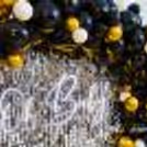Plan a grand baby shower celebration with CherishX's Black and Gold themed premium sequins decor!