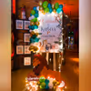 Theme based Welcome Board (3x2ft) with Easel Stand decorated with a balloon arch.