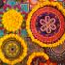 CherishX's Diwali Decoration with 2 pots decorated with 2 yellow Flower Garlands and Green leafs.