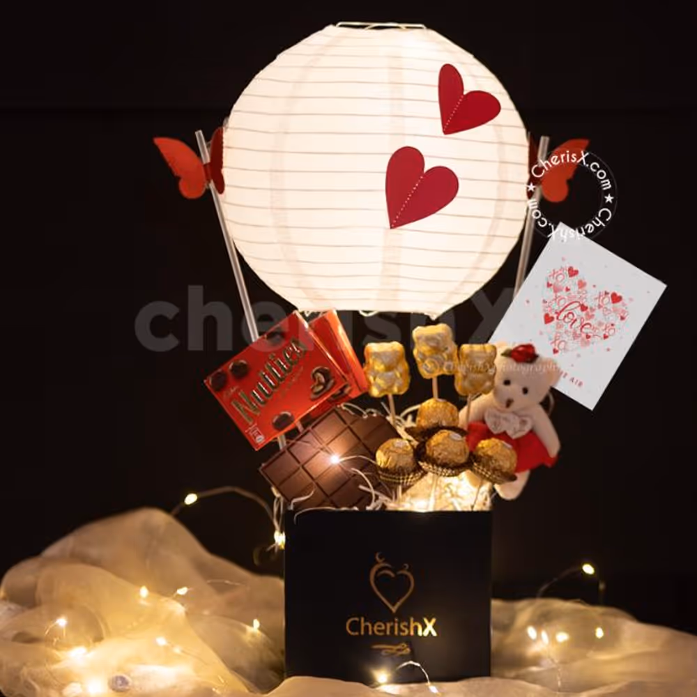 Celebrate this Valentine's Day and week beautifully with CherishX's Exclusive Chocolate Parachute Bucket Gift!