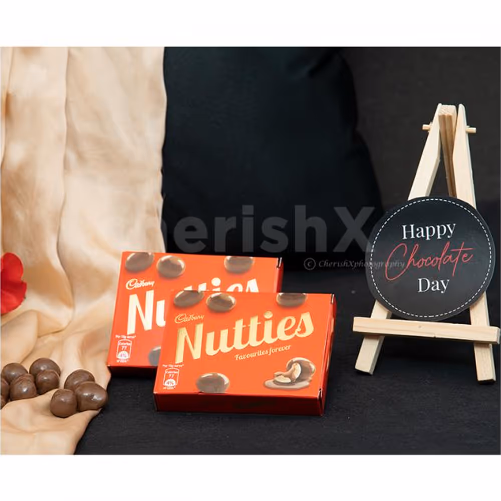 A Romantic Valentine's Countdown black box includes nutties for Chocolate Day