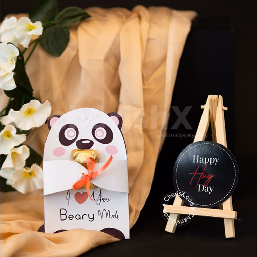 A Romantic Valentine's Countdown black box includes a cute Panda Card for Hug Day