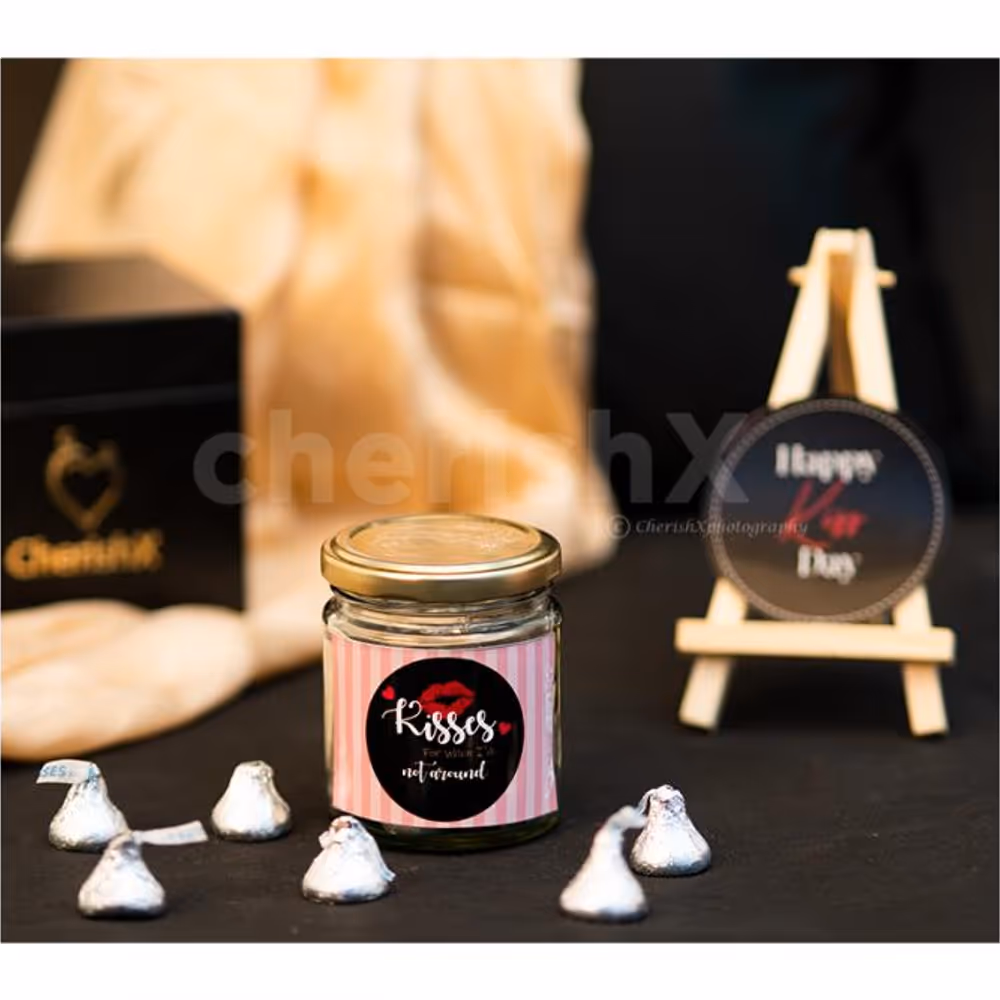 A Romantic Valentine's Countdown black box includes a beautiful jar of kisses for Chocolate Day